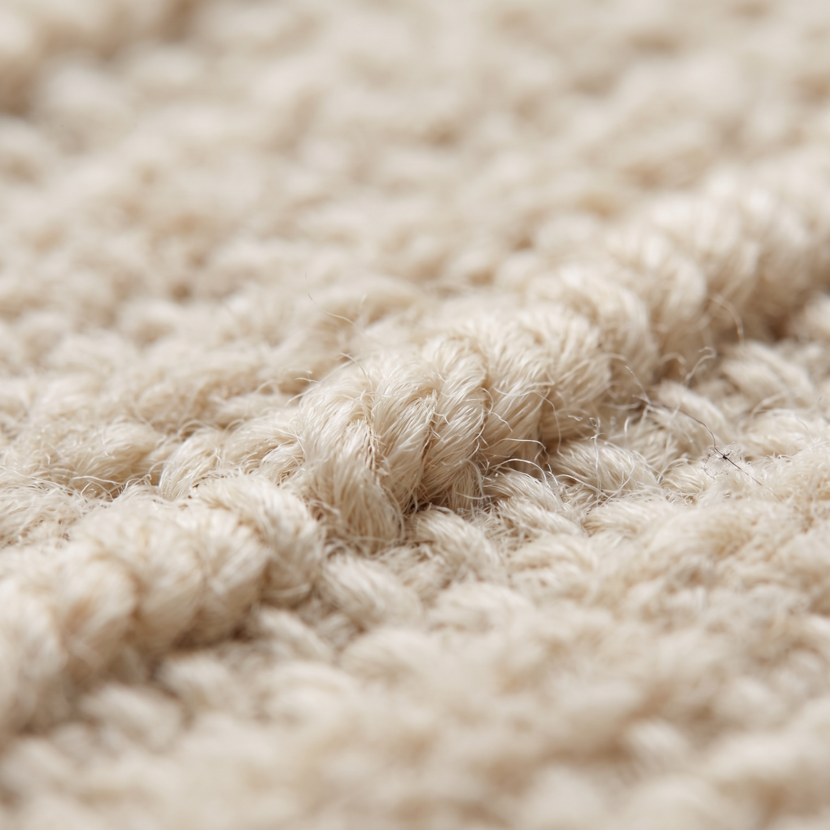 Zoom qualité du tissage du tapis Moustiers Ivoire