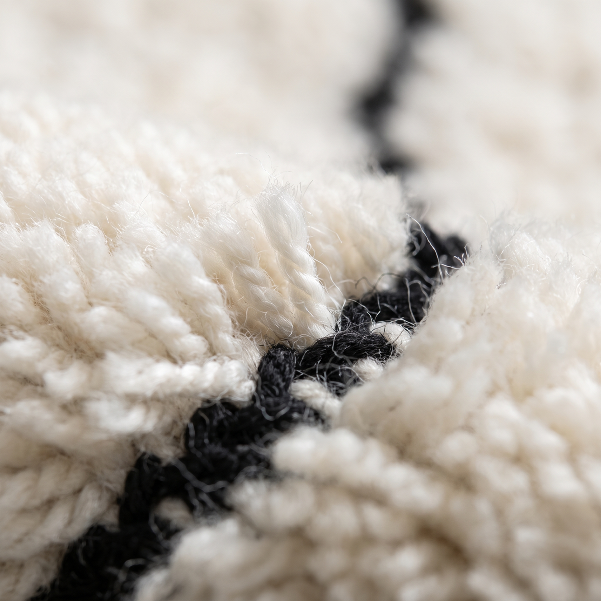 Zoom qualité du tissage du tapis Grignan