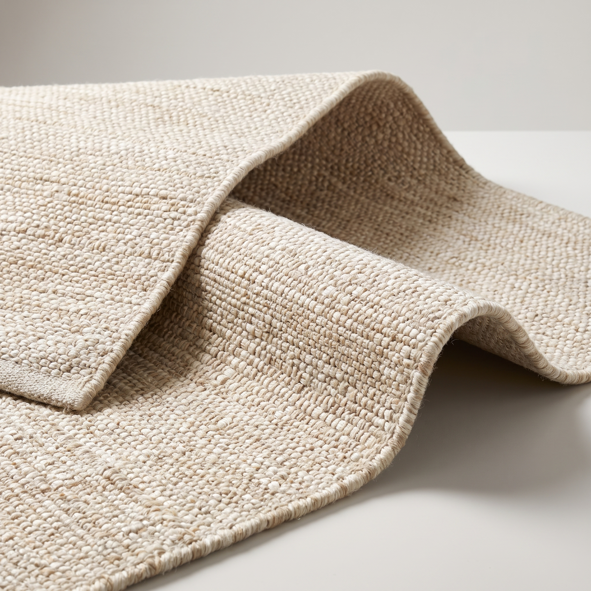 Angle et pli du tapis Arradon Naturel - détail du tissage
