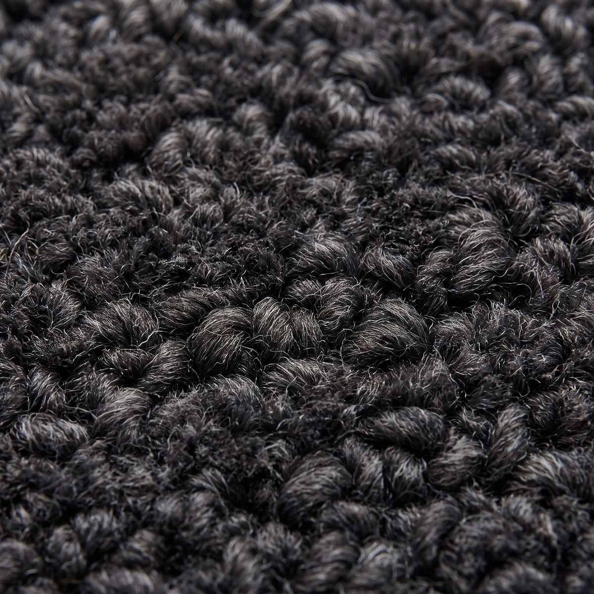 Zoom qualité du tissage du tapis Arradon Carbone