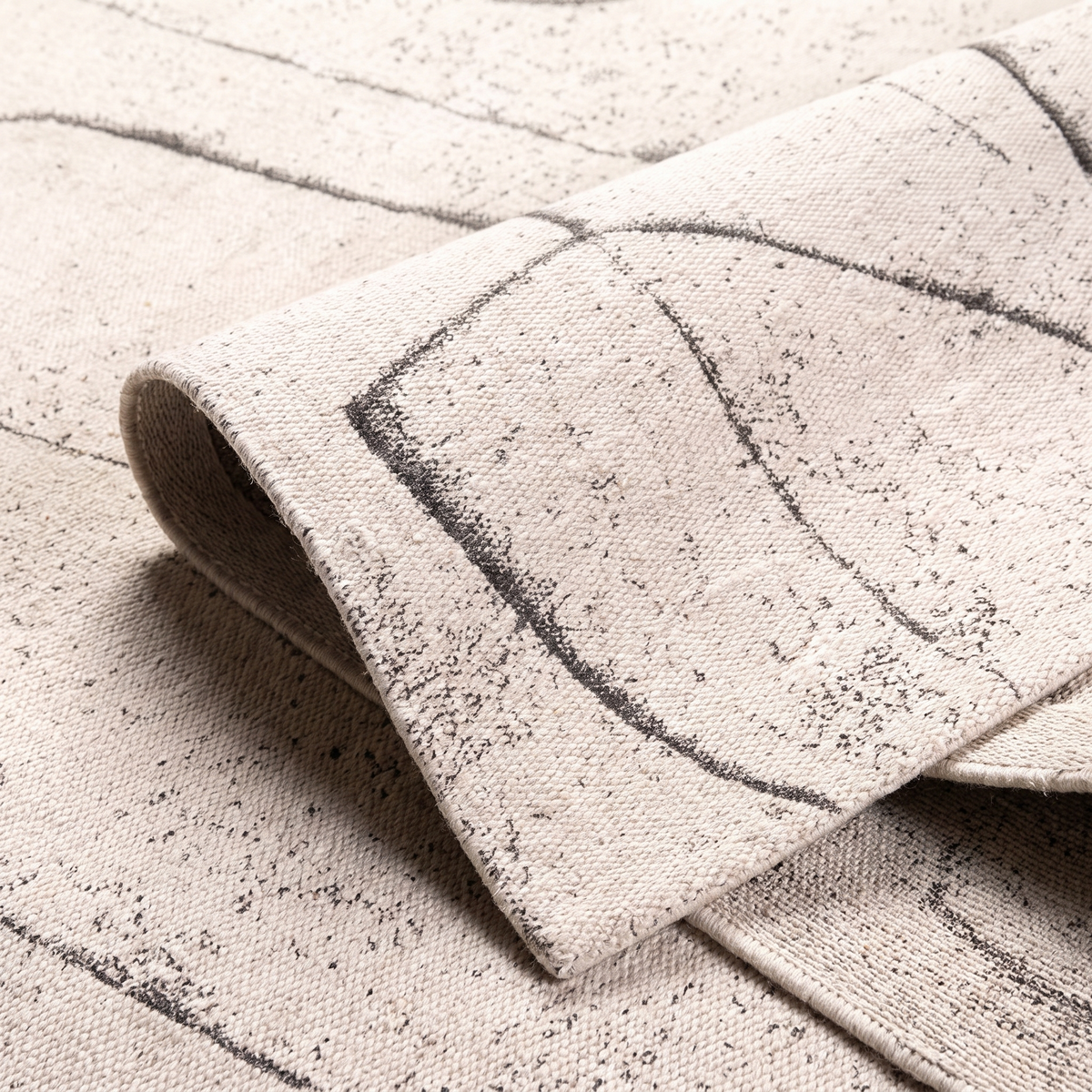 Angle et pli du tapis Amboise Naturel - détail du tissage