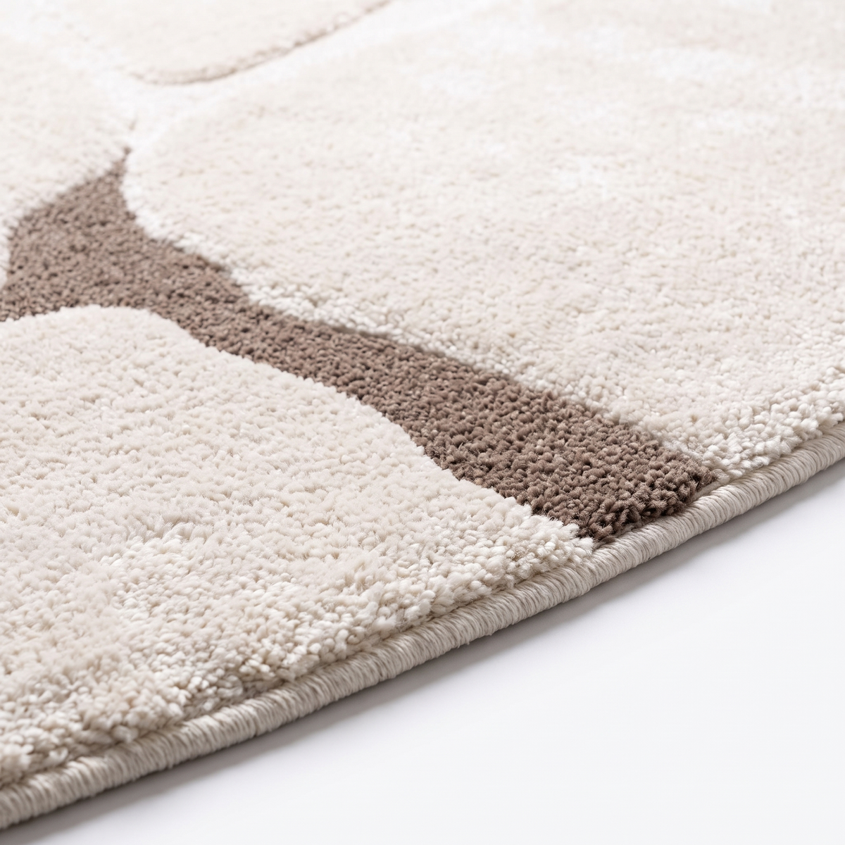 Angle et pli du tapis Galet recyclé Bonnieux - détail du tissage