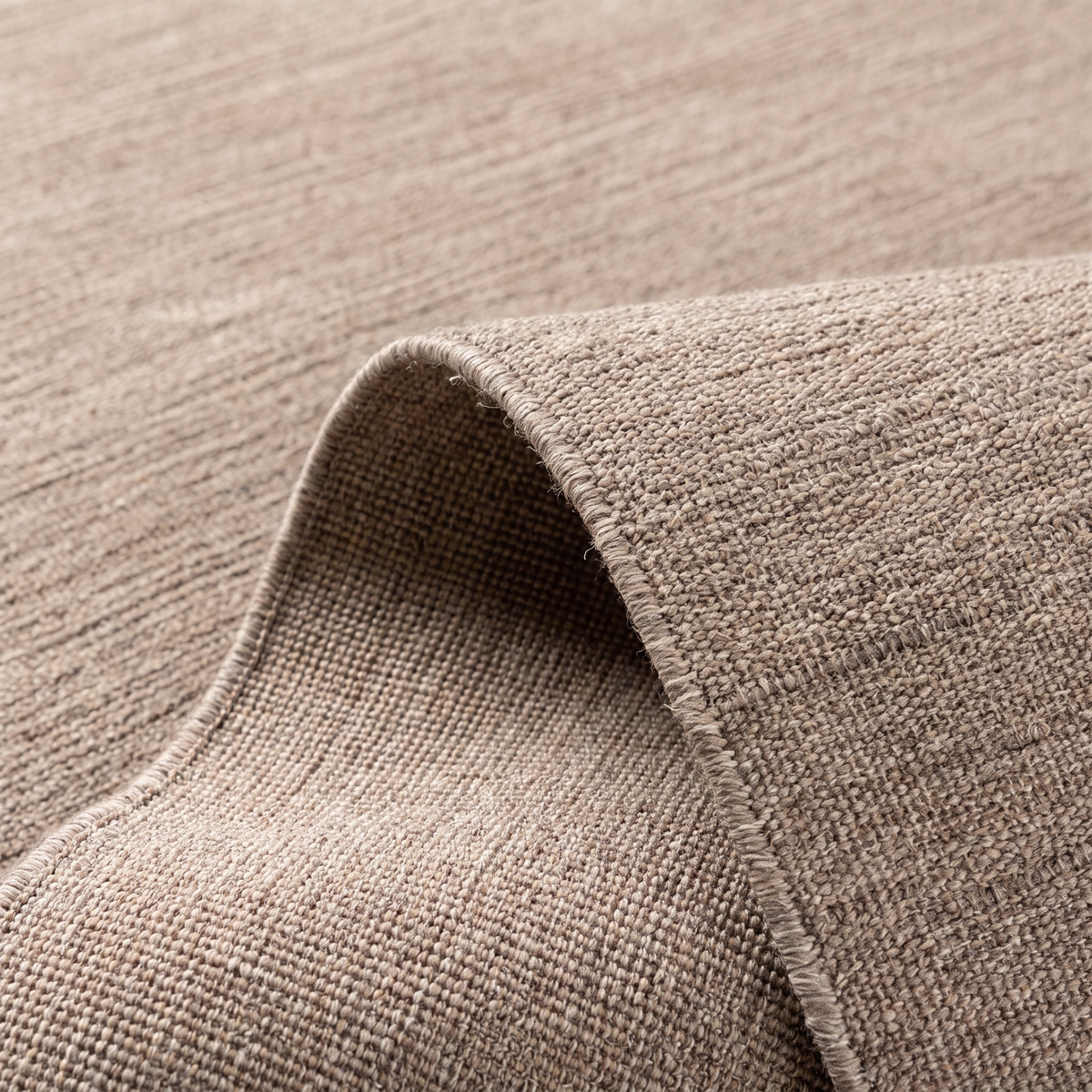 Angle et pli du tapis Dieulefit Naturel - détail du tissage