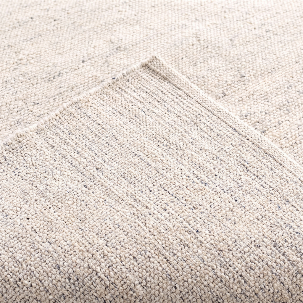 Angle et pli du tapis Dieulefit Neige - détail du tissage
