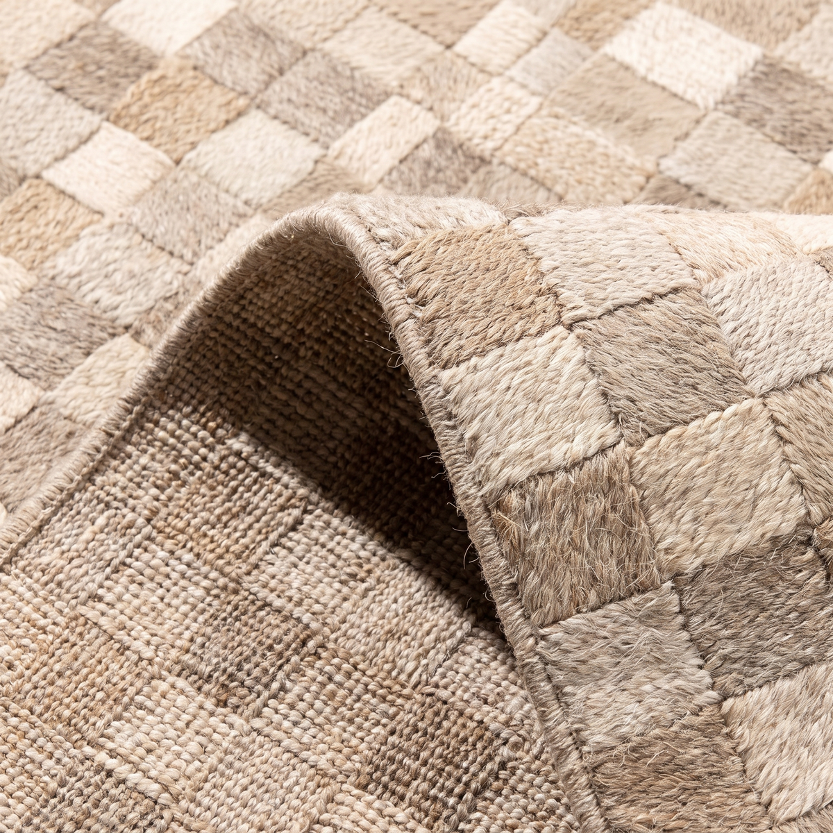Angle et pli du tapis Camargue Naturel - détail du tissage