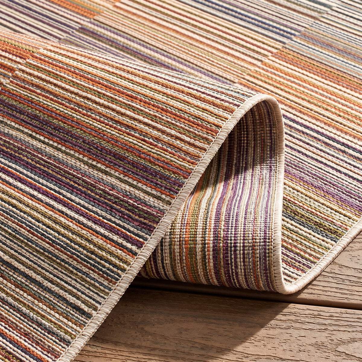 Angle et pli du tapis Bandol Papaye - détail du tissage