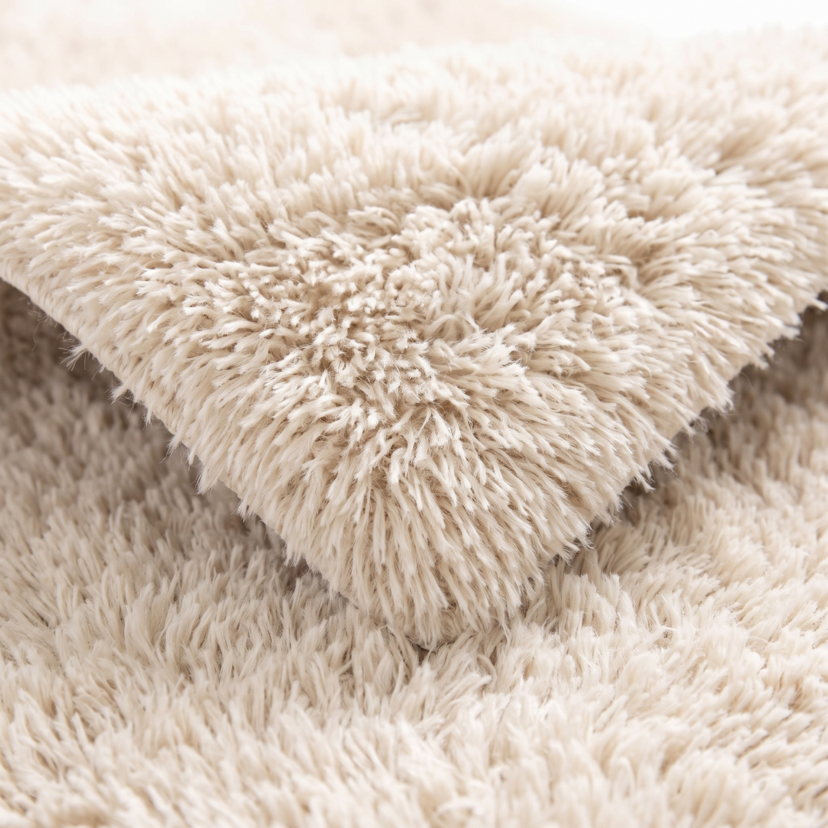 Angle et pli du tapis Aravis Ivoire - détail du tissage
